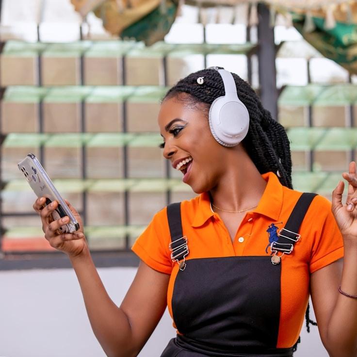 Kaveri Mehta, Lead Design Curator at Lotus Drift Fern Wood, reviewing corporate floral arrangements